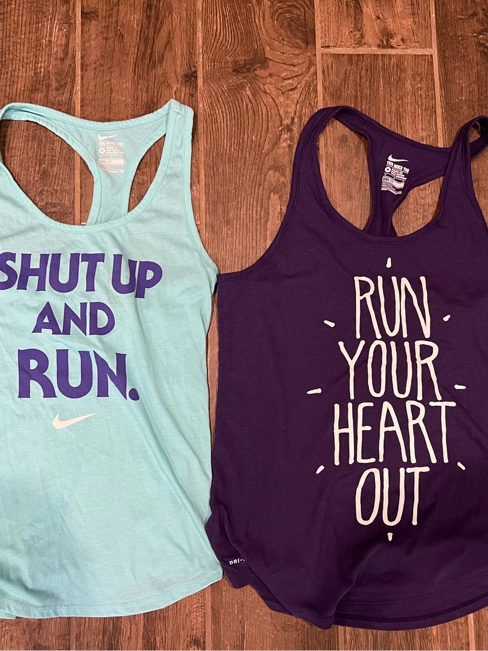 Nike Womens size M Racerback Tank - Light Blue with Purple Text
